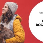 A woman with a dog in her hands